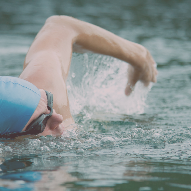 Man swimming in pool