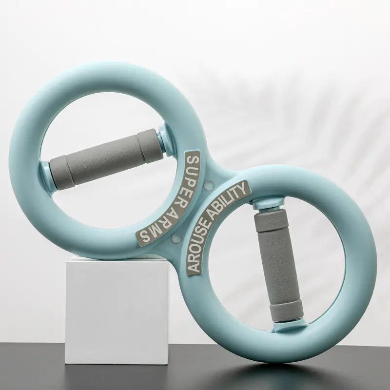 Light blue arm exercise rings with gray handles on a white background