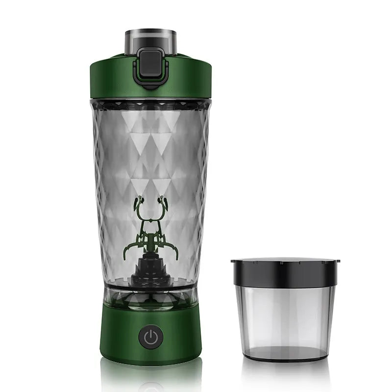 Green portable blender with clear container on a white background