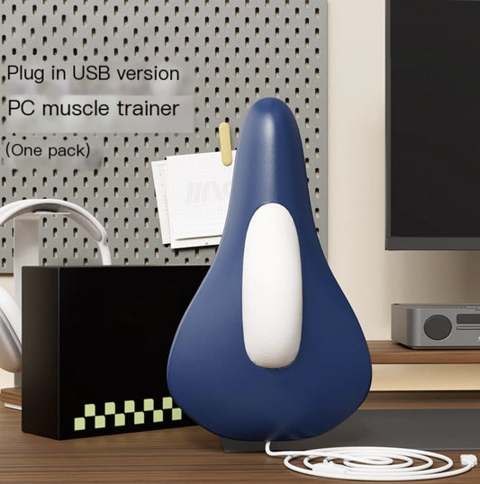 Blue and white device on a desk with packaging and a computer in the background