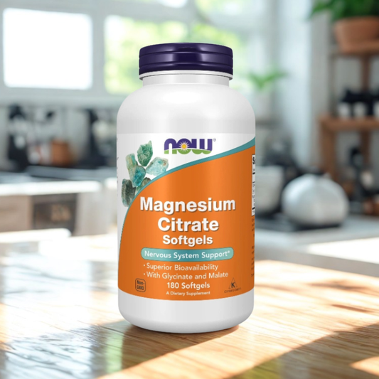 Bottle of NOW Magnesium Citrate Softgels on a kitchen counter