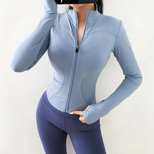 Person wearing a blue and purple athletic outfit on a plain background