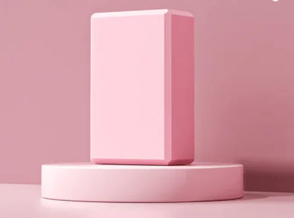 Pink rectangular block on a matching pink platform against a pink background