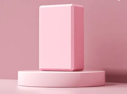 Pink rectangular block on a matching pink platform against a pink background