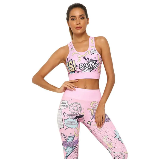 Woman wearing a pink sports bra and leggings with comic book-style graphics on a white background