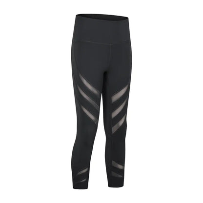Black leggings with gray mesh panels on a white background